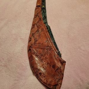 Red snake/ black snake reversible sash bag